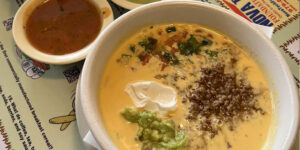 Queso is the perfect way to start your meal at Mariachis serving the best tex mex in Brenham, TX