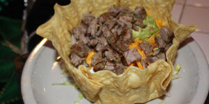 Enjoy a taco salad from Mariachis serving the best tex mex in Brenham Texas